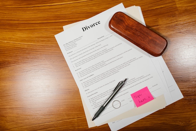 divorce paper and ring