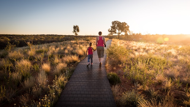 parent walking with child