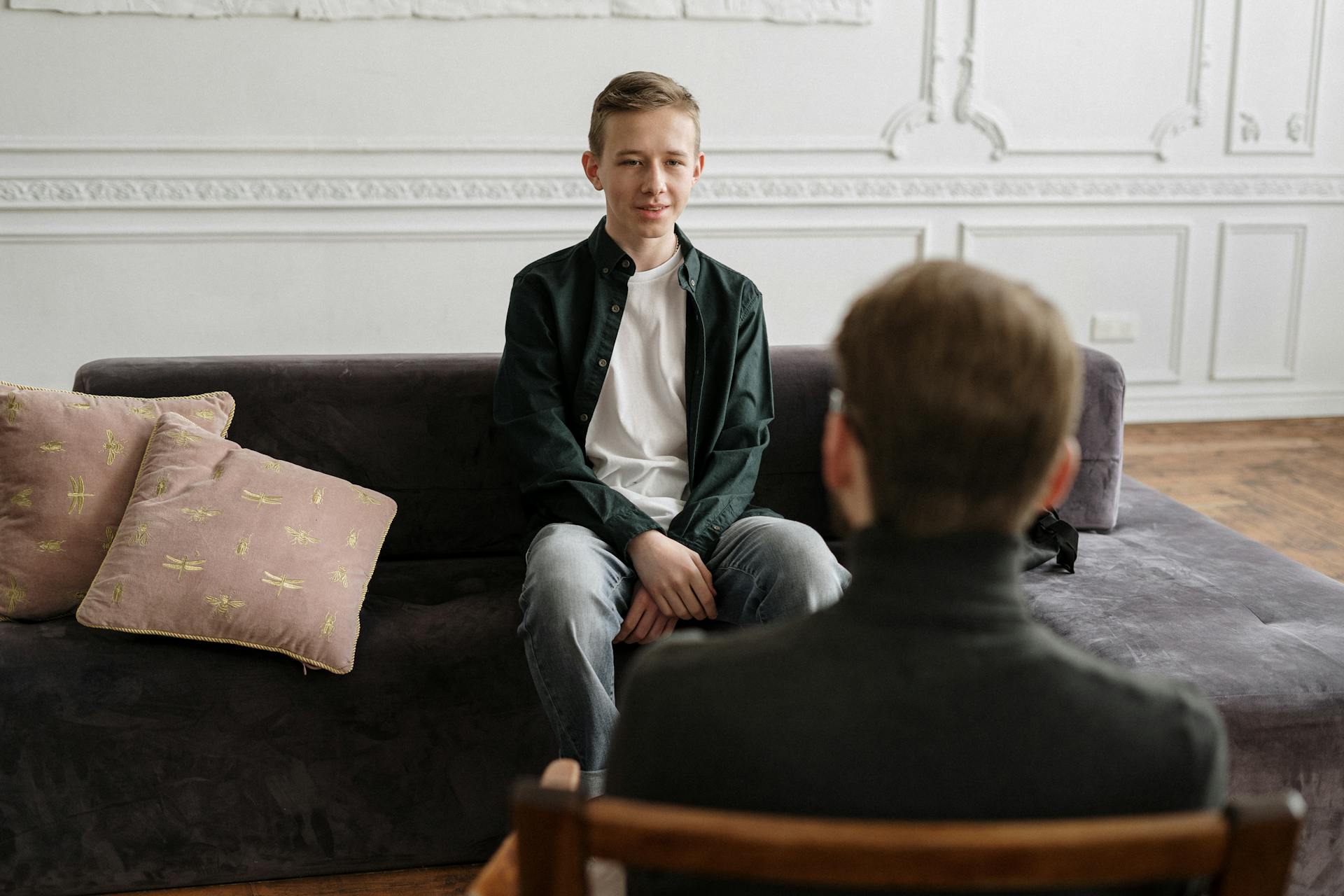 teen speaking to adult