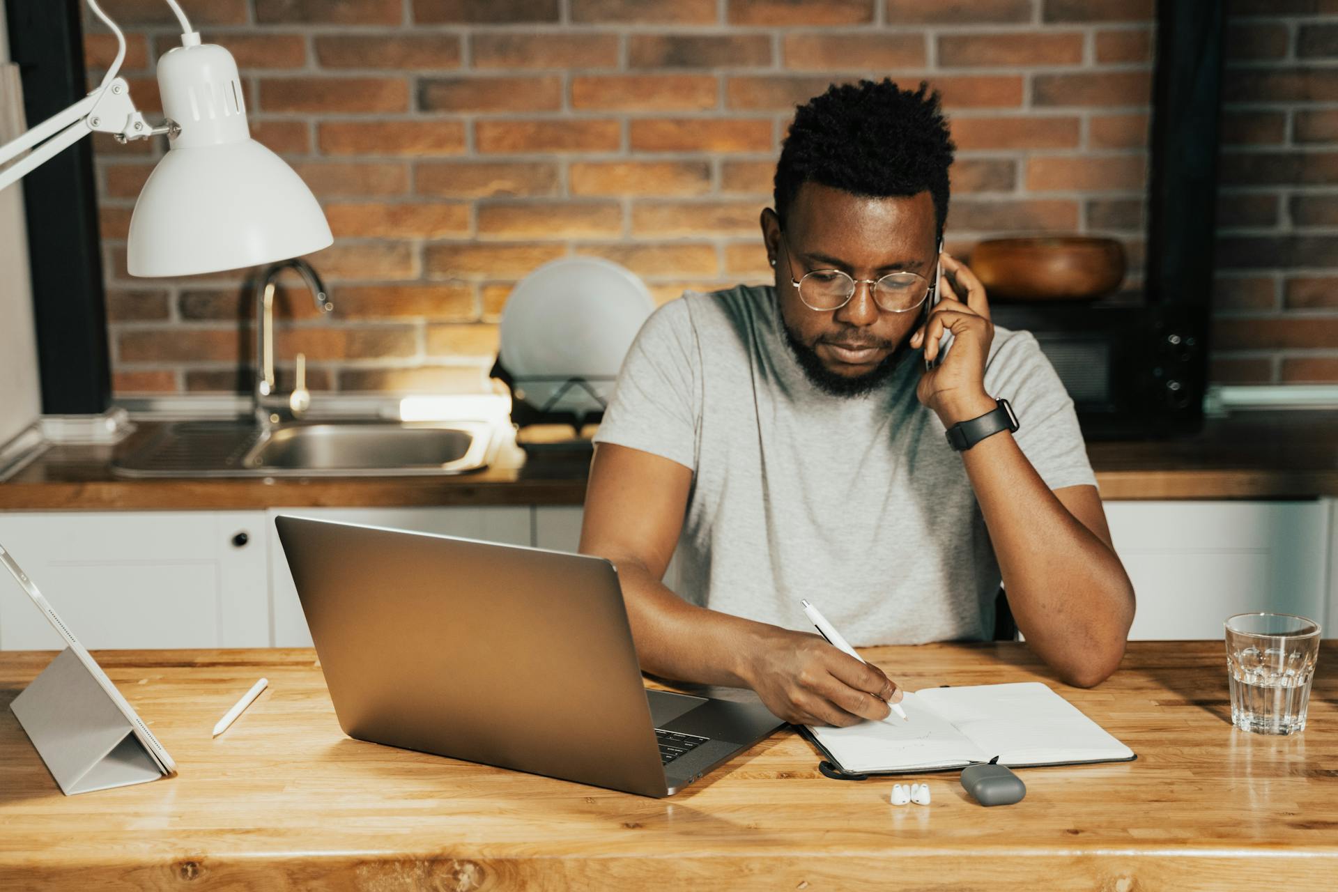 stressed man at desk and computer