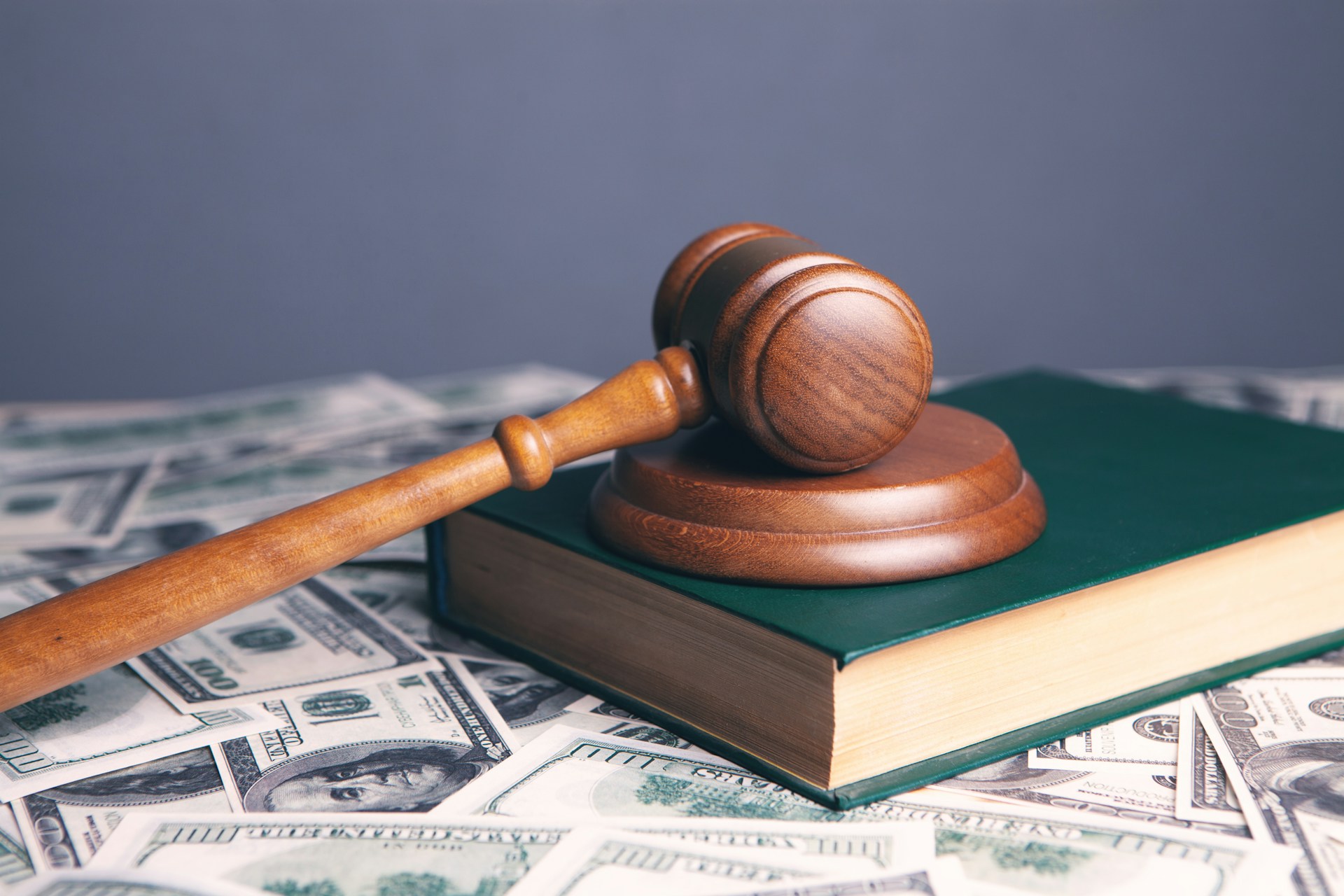 gavel on top of money